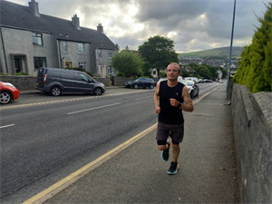 Council’s very own “Iron Man” takes on marathon challenge for cancer charity!