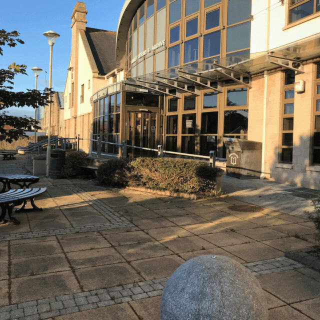 Photo slideshow of front courtyard of Orkney Library and Archive in Kirkwall, and the Orkney room.
