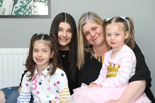 Georgia with her family - photo by Ken Amer.