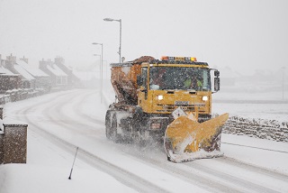 Gritter vehicle in the snow.