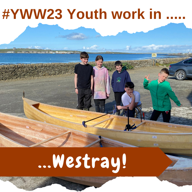 Photo of young people in Westray with their completed canoes.