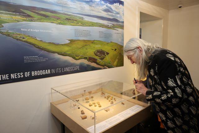 Professor Mary Beard viewing the Ness of Brodgar exhibition